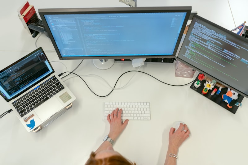 USB cable connecting smartphone to laptop for debugging